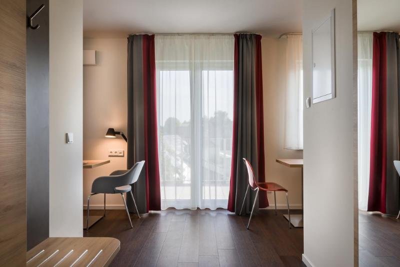 Фото Signature East Hotel Apartment