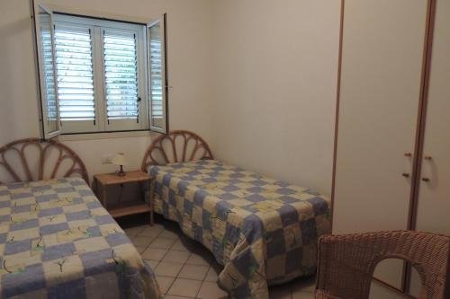 Фото Affittimoderni Isola Rossa Élite