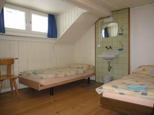 Гостиница Happy Inn Lodge в Интерлакене