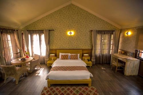 Фото Tangalwood Boutique Hotel