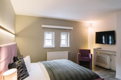 Фото Boutique Hotel Pfauen