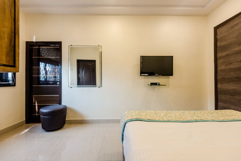 Фото Oyo 8373 Rigga Inn