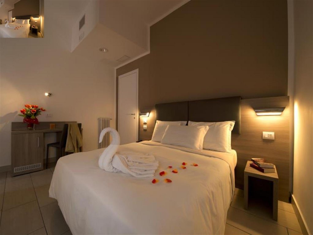 Фото Oasi Village Hotel