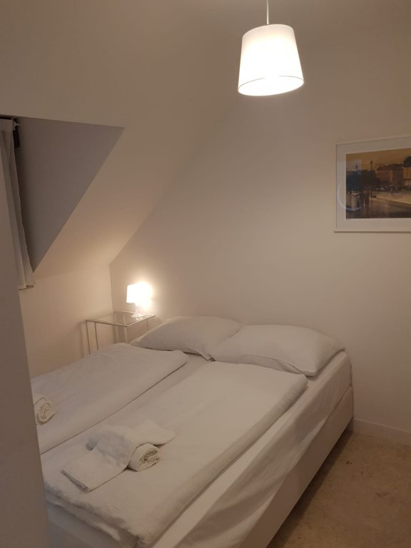 Фото Cozy and Bright Duplex Near City Center