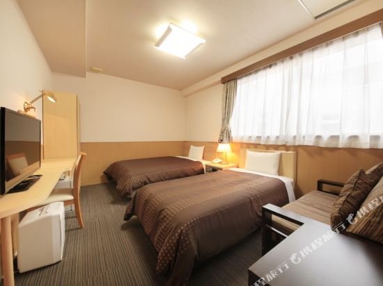 Фото Sendai Business Hotel