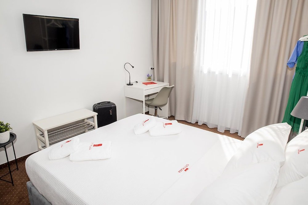 Фото City Plaza Apartments & Rooms