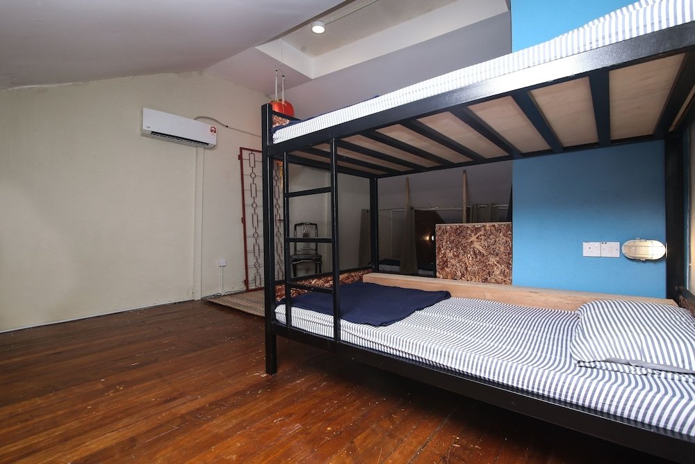 Фото Spot On 89929 Tropical Lodge