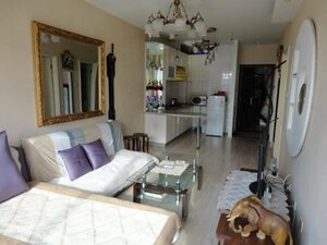 Апартаменты Dalian Xiu Zhu Mansion Apartment