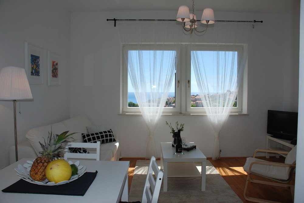 Фото Luigi apartments