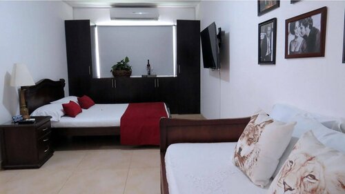 Гостиница Arco Apartasuites в Кали