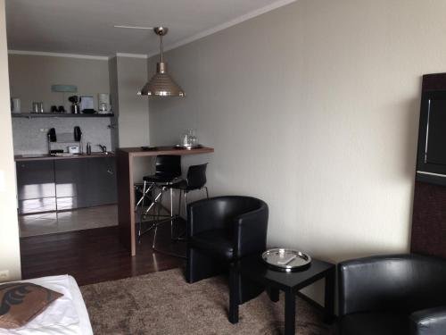 Фото Rheinblick Appartments