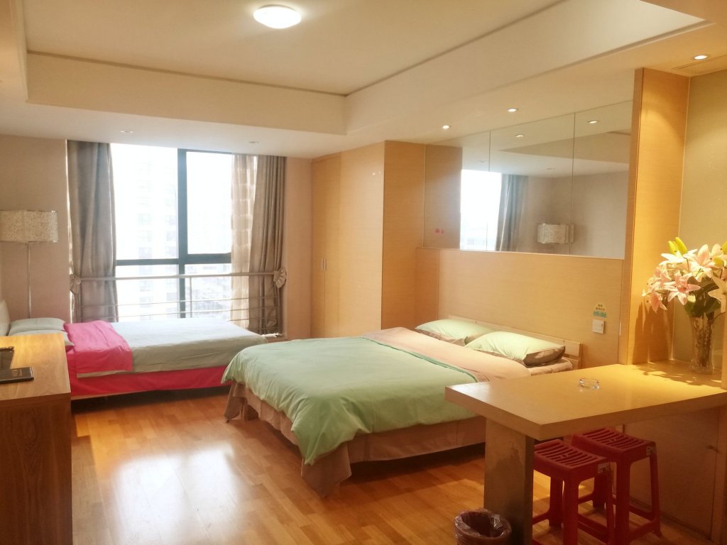 Фото Xi'an Tangyun Aparthotel