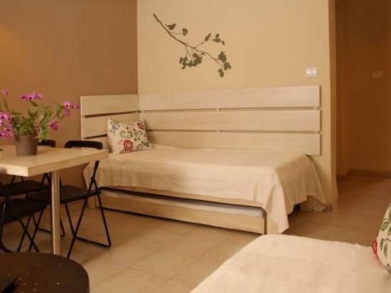 Фото Shaar Hagolan Kibbutz Country Lodging