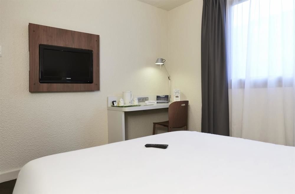 Фото Campanile Lyon Centre Berges du Rhône