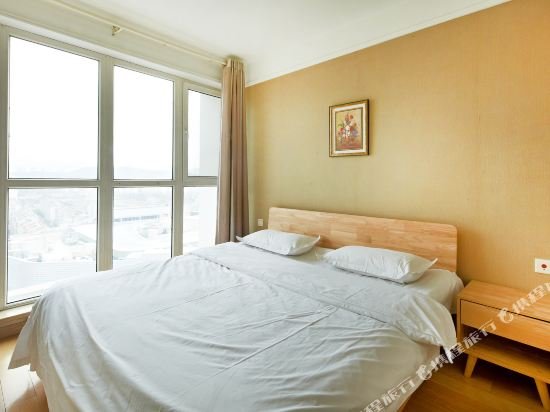 Фото Wanke City International Apartment