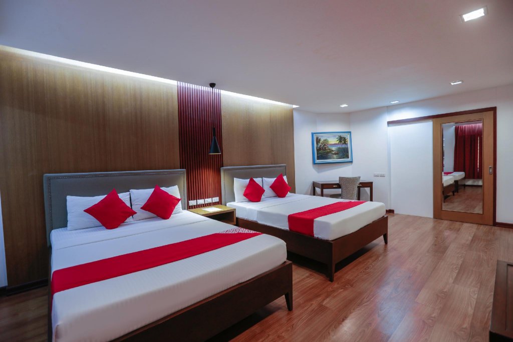 Фото Capital O 740 Bliss Hotel Dau