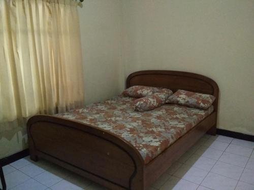 Фото Penginapan Kunthi