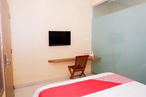 Фото Oyo 379 Grand Mundu