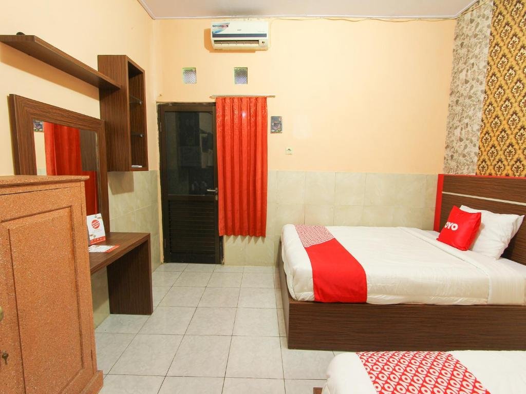 Фото Oyo 1594 Al Firdausi Residence