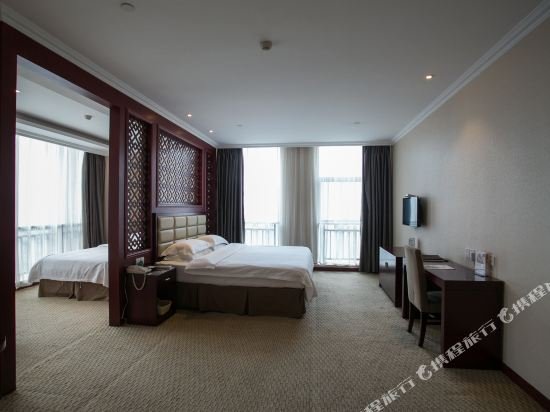 Фото GreenTree Inn Shaoxing Keqiao Xingyue Road Zhongqing Building Hotel