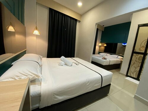 Гостиница Smile Hotel Wangsa Maju