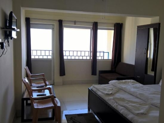 Фото Hotel Garhwali Inn