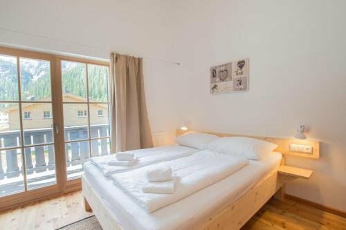 Гостиница Tauerndorf Enzingerboden Ski In&Out - Steinbock Lodges
