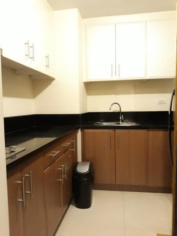 Фото Tess and Tessha Condotel near T3 Airport