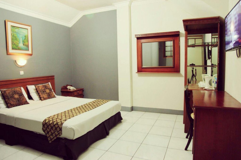 Фото Cihampelas Hotel 2