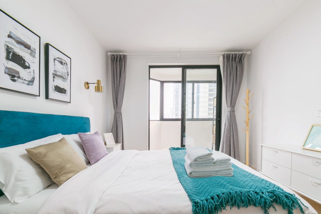 Фото Lazy Apartment - Taikang Road