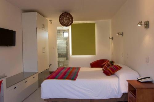 Фото Avenida Hotel