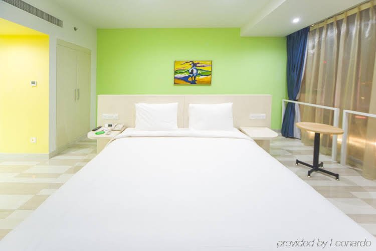 Фото Vatica Qingdao Licang Xiazhuang Hexie Plaza Hotel