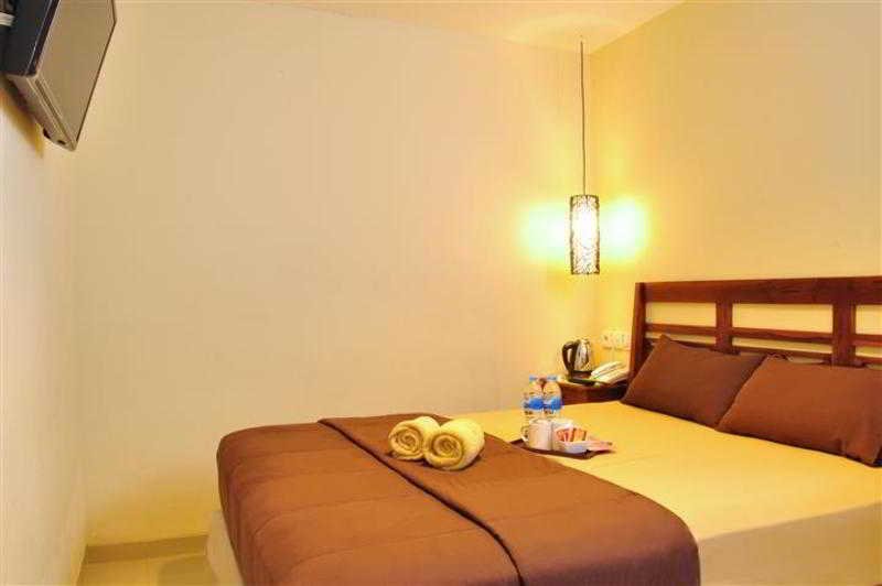 Фото S8 Suardana Hotel