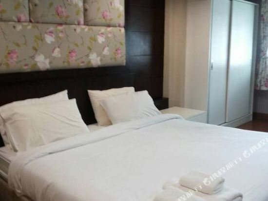 Фото Oyo 995 Blue Cafe Apartment