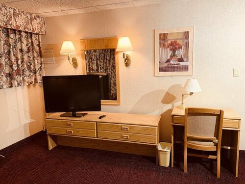 Гостиница Coliseum Inn & Suites - Garden City Long Island