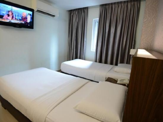 Фото Tai Ichi Hotel