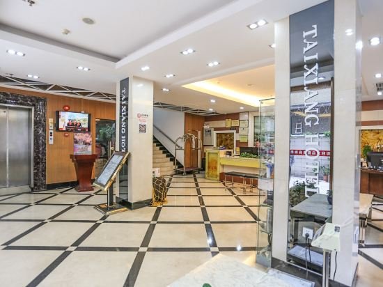 Фото Tai Xiang Business Inn