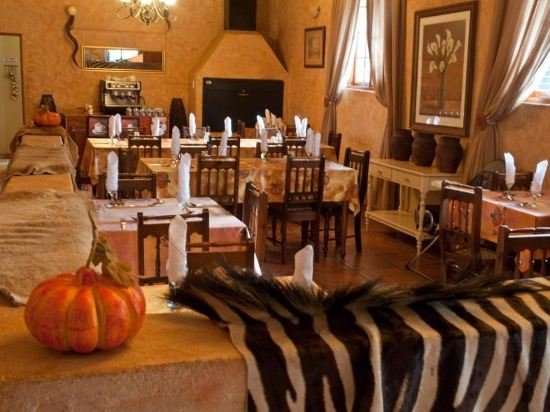 Фото Old Mill Lodge, Working Ostrich Farm & Restaurant, Oudtshoorn