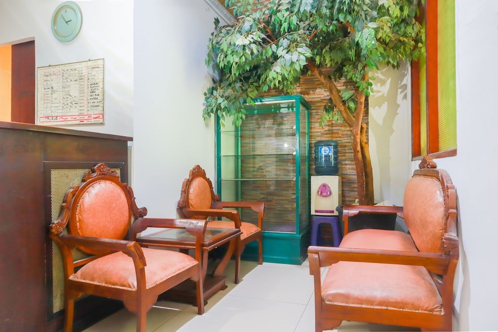 Фото Melawai Homestay by Oyo Rooms