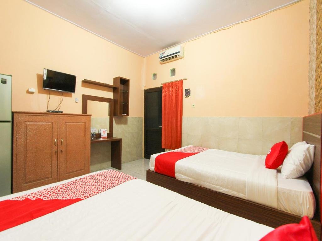 Фото Oyo 1594 Al Firdausi Residence