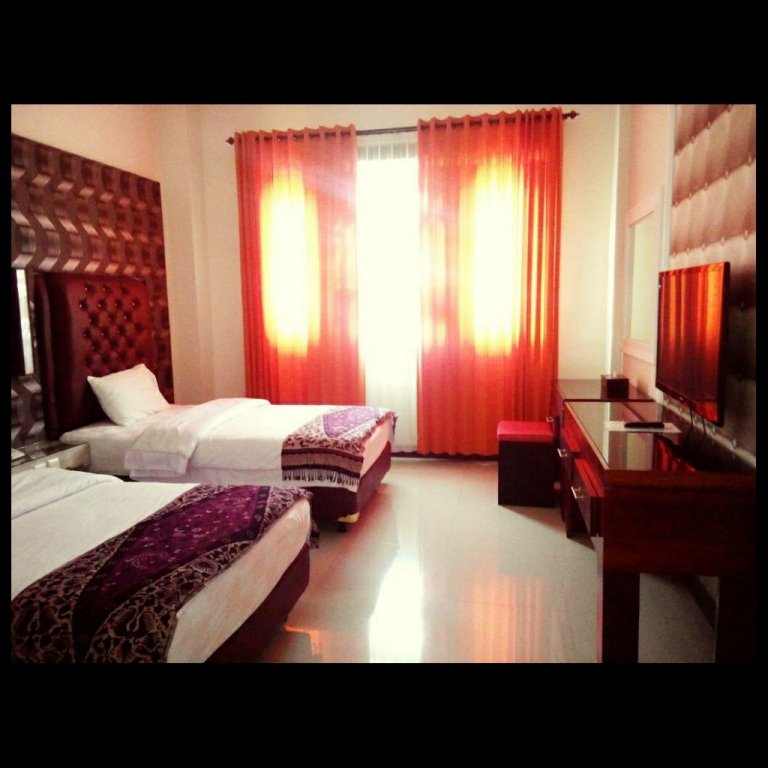 Фото Grand City Batu Hotel