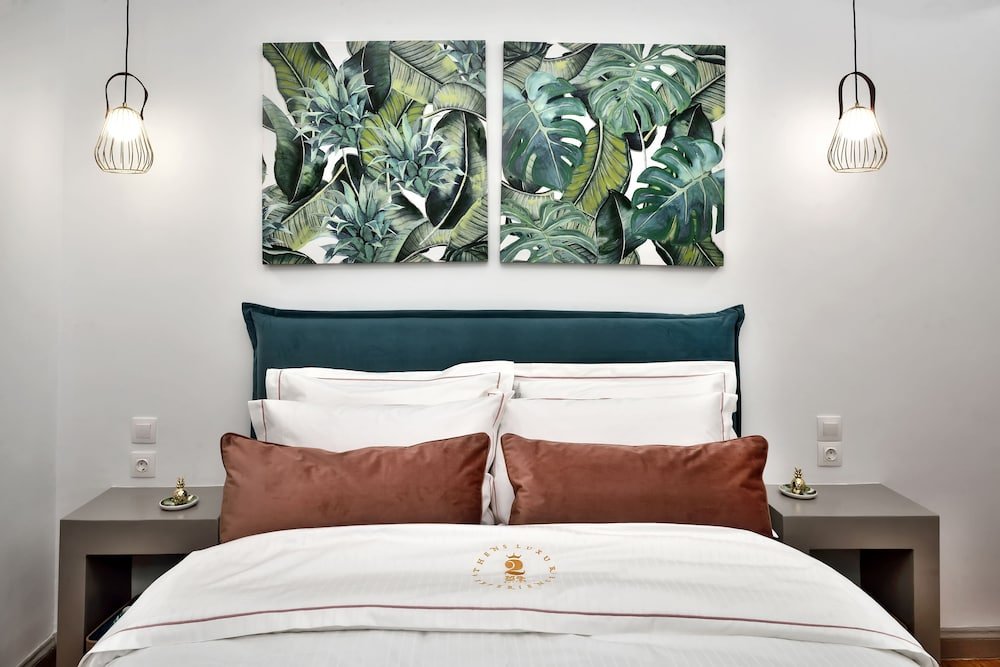 Фото 2 Mazi Suites