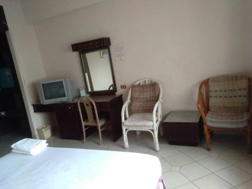 Фото Petchkasem Grand Hotel