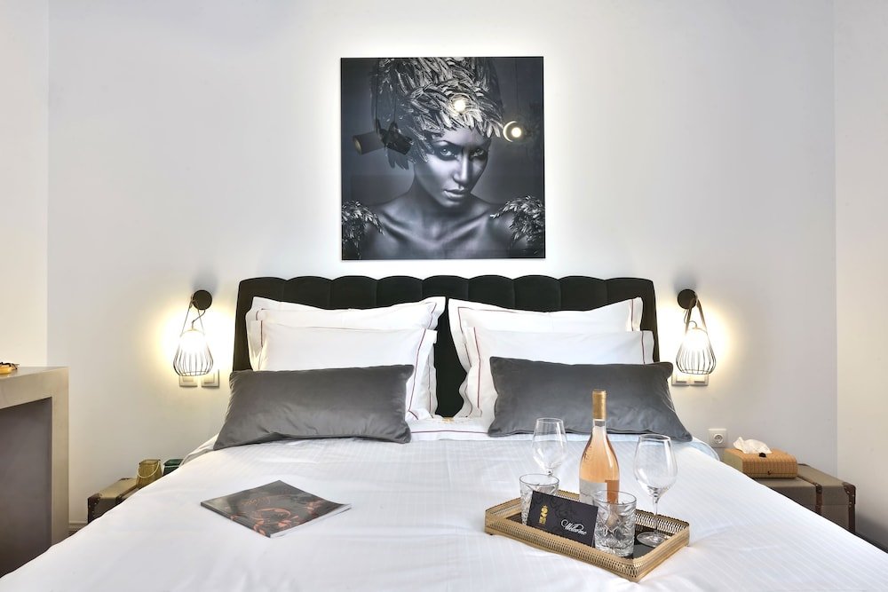 Фото 2 Mazi Suites