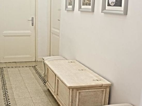 Фото Merulana Suite Apartment