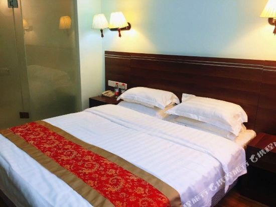 Фото Xinghua Hotel
