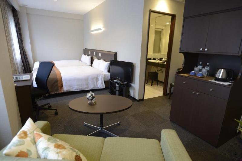 Фото Natural Hot Spring Midosuji Hotel