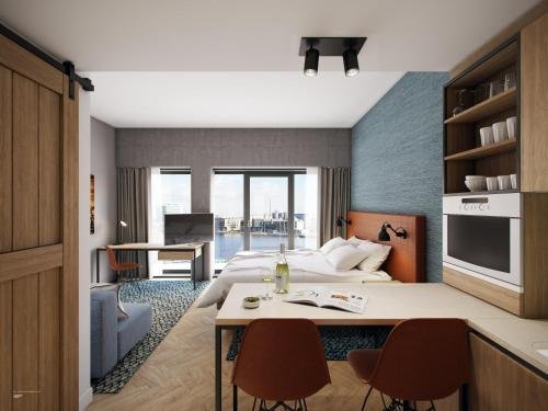 Фото Residence Inn by Marriott Amsterdam Houthavens