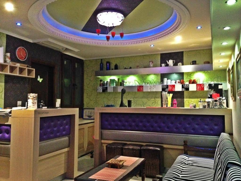 Фото Captain's Beach Boutique Apartments