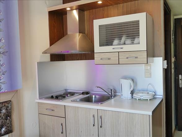 Фото Captain's Beach Boutique Apartments